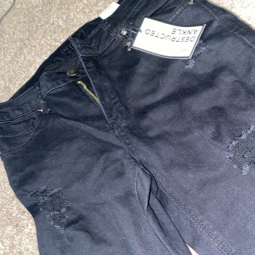 NWT black distressed skinny jeans